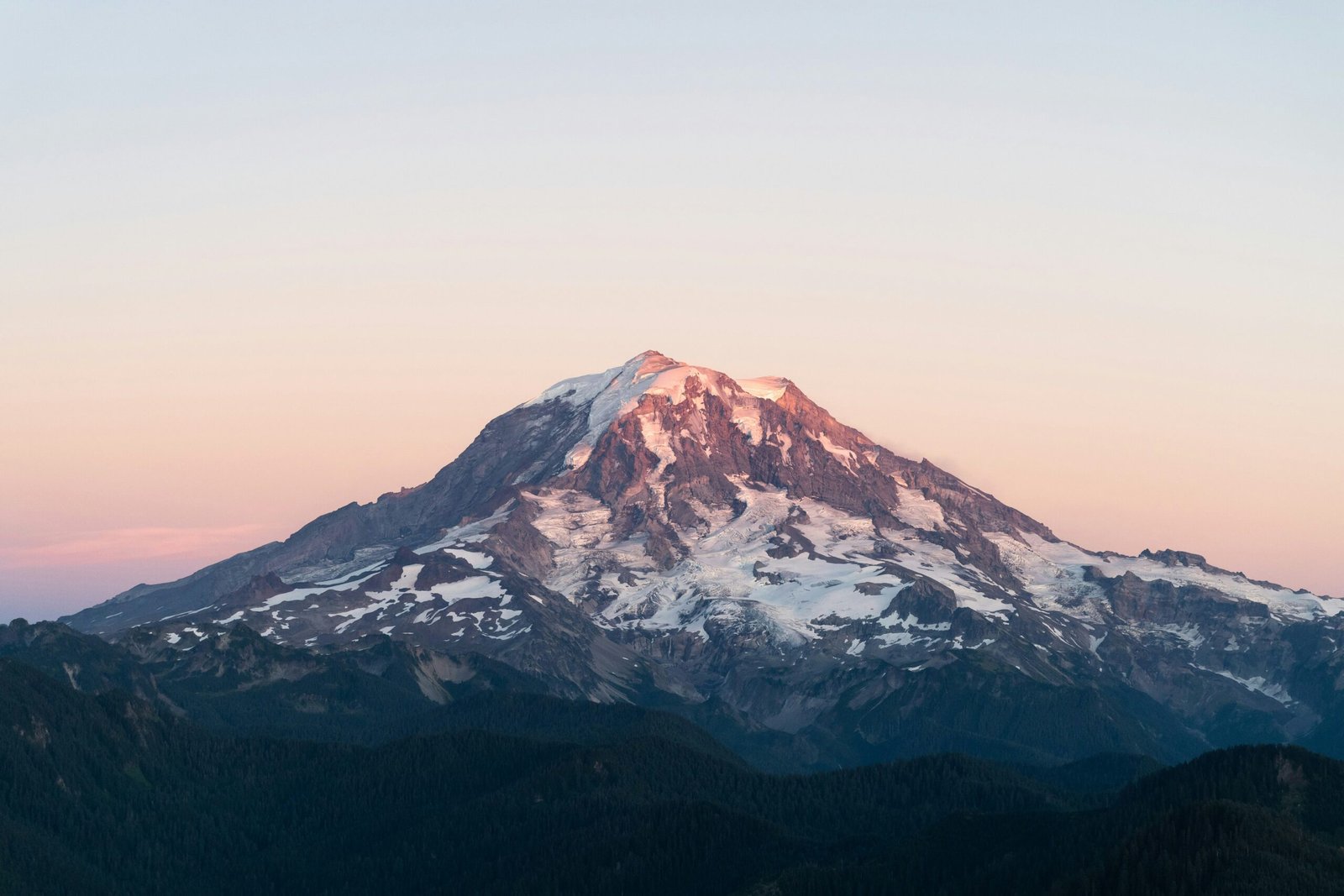 snow covered mountain during daytime